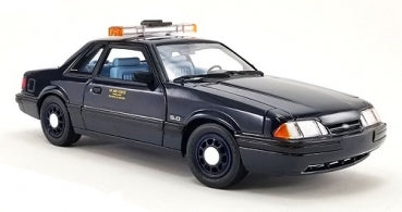 1:18 scale diecast black police car model with roof lights and detailed interior