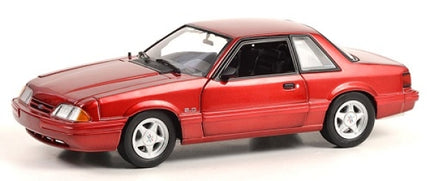Red 1:18 scale diecast model car, classic coupe design, detailed exterior, silver wheels