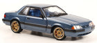 1:18 scale blue diecast model car with gold rims and detailed interior