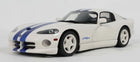 1:18 scale white diecast sports car model with blue racing stripes and detailed exterior