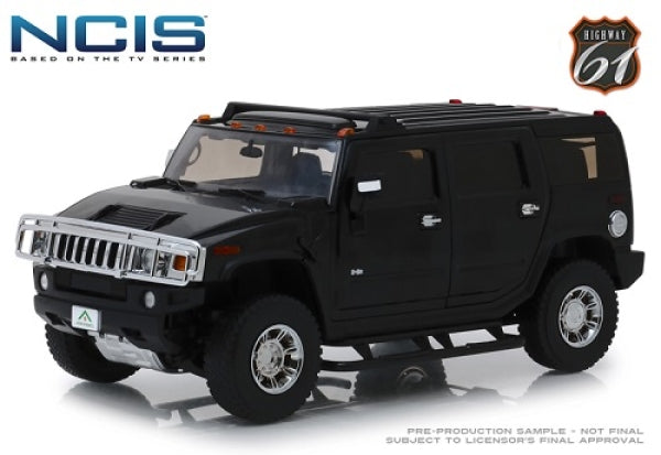 1:18 scale diecast model black Hummer H2 SUV with NCIS TV series branding, detailed exterior