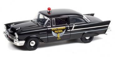 1:18 scale diecast model black police car with State Highway Patrol graphics and red siren