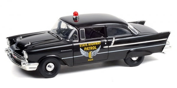 1:18 scale diecast 1957 black police car with State Highway Patrol Ohio markings and red siren