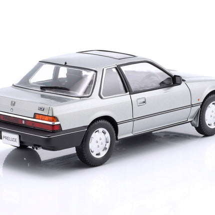 https://a.allegroimg.com/original/11a296/324d0e5c4028ab6fda343ece62c4/Honda-Prelude-1985-Grey-Metallic-WhiteBox-1-24-Metalowy-Model-Samochodu-Stan-opakowania-oryginalne