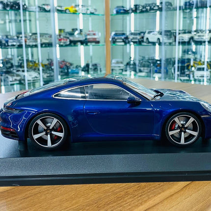 Minichamps Porsche 911 Carrera 4S 2019 1:18 Blue Metallic Diecast Model Car - studio product photo of the scale model