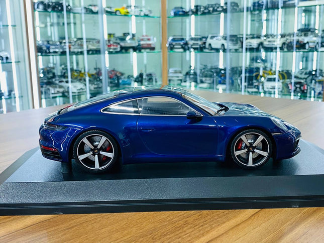 Minichamps Porsche 911 Carrera 4S 2019 1:18 Blue Metallic Diecast Model Car - studio product photo of the scale model