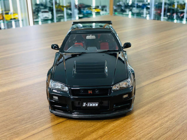 Motor Helix Nissan Skyline GT-R R34 Z-Tune Nismo 1/18 Black Pearl Diecast Model - studio product photo of the scale model