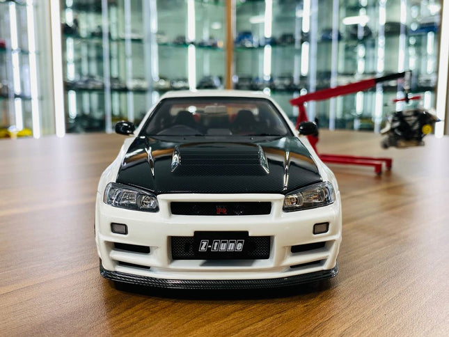 MotorHelix 1:18 Nissan Skyline GT-R R34 Nismo Z-Tune Diecast Model White - studio product photo of the scale model