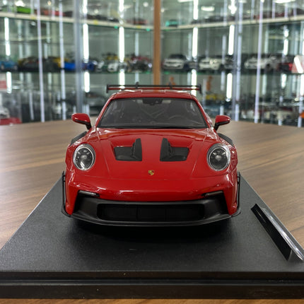 1/18 Diecast Porsche 911 (992) GT3 RS 2024 in Guard Red | Solido - studio product photo of the scale model