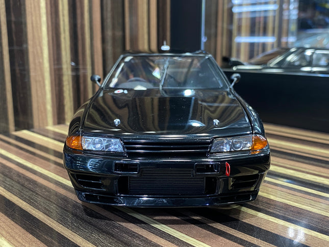 AutoArt Nissan Skyline GT-R R32 Black 1:18 Diecast Model Car - studio product photo of the scale model