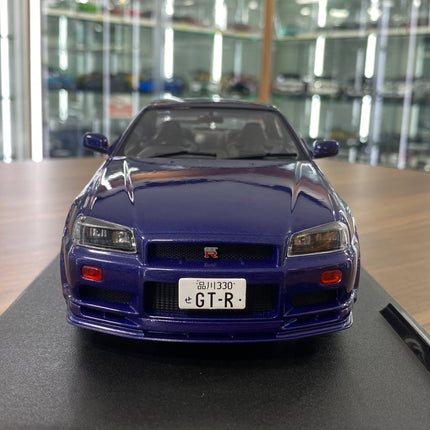 Solido Nissan GT-R R34 Skyline 1999 1:18 Dark Blue Diecast Model Car - studio product photo of the scale model