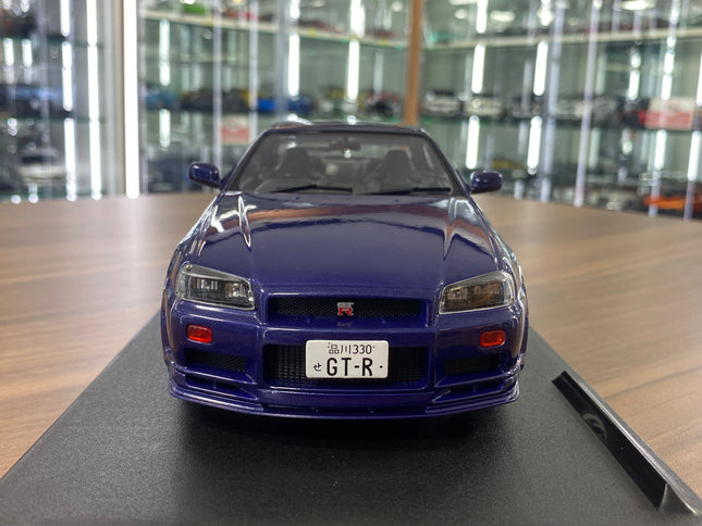 Solido Nissan GT-R R34 Skyline 1999 1:18 Dark Blue Diecast Model Car - studio product photo of the scale model
