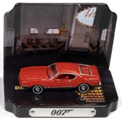 Red diecast model car in display case with 007 label, collectible scale car toy