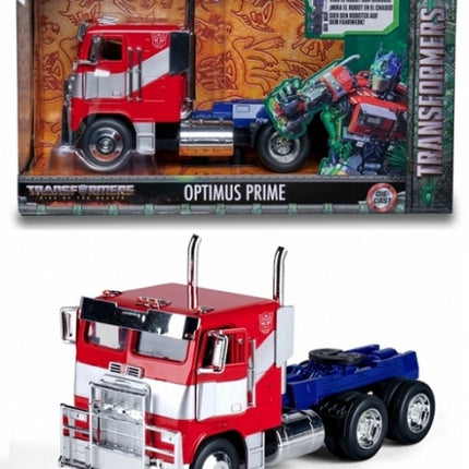 Diecast model of Optimus Prime red and blue truck with packaging, collectible vehicle toy.