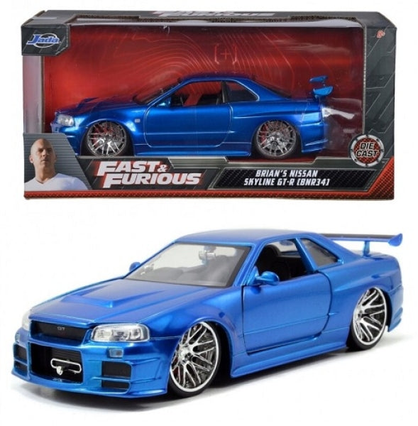 Blue Nissan Skyline GT-R R34 diecast model car from Fast and Furious, with display box.