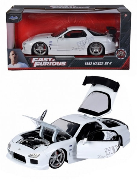 1:24 scale diecast 1993 Mazda RX-7 model car, white, with Fast & Furious packaging, open hood and doors