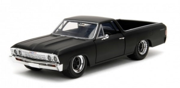 Diecast model of a matte black classic pickup truck with chrome details, front angle view