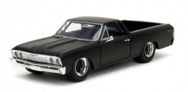 1:24 scale diecast black classic pickup model car with chrome detailing on white background