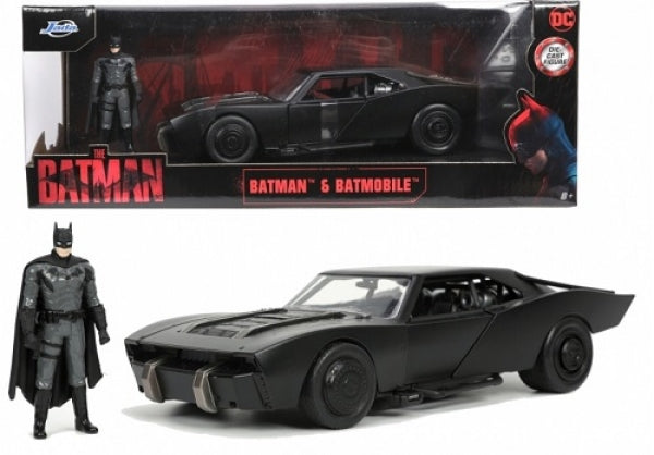 Batman action figure with black Batmobile diecast model car in packaging