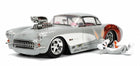 Silver diecast classic car model with exposed engine and cartoon rabbit figure beside it