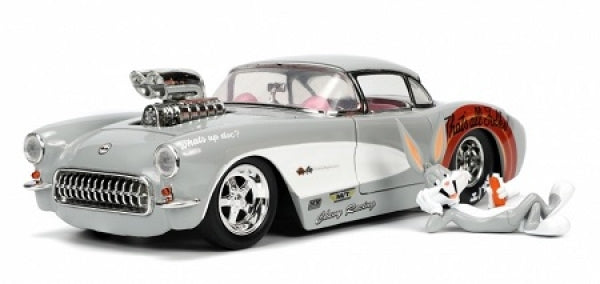Silver diecast classic car model with exposed engine and cartoon rabbit figure beside it