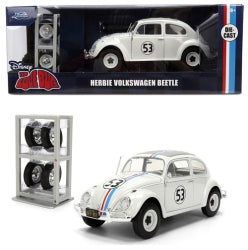 Herbie Volkswagen Beetle 1:24 diecast model car with racing stripes and extra wheels, boxed.