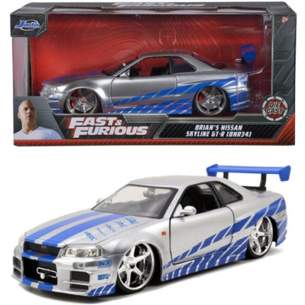 1:24 scale diecast model of silver Nissan Skyline GT-R R34 with blue stripes from Fast & Furious