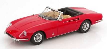 Red diecast convertible model car with detailed interior and classic wire wheels