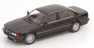 1:18 scale black diecast model car, four-door sedan, silver wheels, collectible display