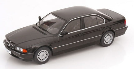 1:18 scale black diecast BMW sedan model car with silver wheels, displayed on white background