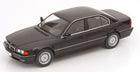 1:18 scale black diecast BMW sedan model car with silver wheels, displayed on white background