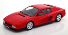 Red 1:18 scale diecast model car featuring a classic sports car design, displayed on white background