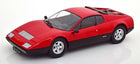 Red diecast model car in 1:18 scale with black accents, classic sports car design