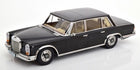 1:18 scale diecast model of classic black Mercedes-Benz sedan with tan interior