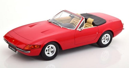 Red 1:18 scale diecast convertible model car with tan interior on white background