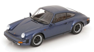Blue 1:18 scale diecast Porsche model car with detailed interior and silver accents