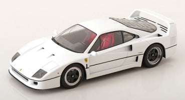 White diecast Ferrari F40 model car with red interior, 1:18 scale, on plain background
