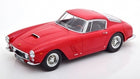 Red diecast model car, classic coupe, 1:18 scale, silver rims, on white background