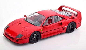 Red 1:18 scale diecast Ferrari model car with black wheels and spoiler on white background