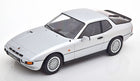 1:18 scale diecast model of a classic silver Porsche sports car on white background