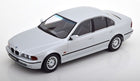 1:18 scale white BMW sedan diecast model car with black trim on white background