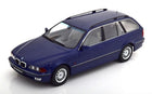 1:18 scale diecast model of blue BMW touring car, detailed exterior, white background