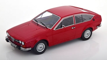 Red diecast model car in 1:18 scale with classic coupe design and silver wheels