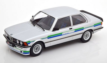 1:18 scale diecast BMW Alpina model car, white with blue and green stripes, detailed wheels