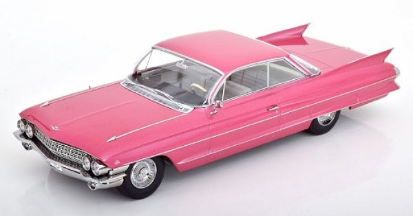 Pink classic Cadillac diecast model car with tailfins, 1:18 scale, side view