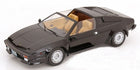1:18 scale black diecast Lamborghini model car with tan interior, driver's door open