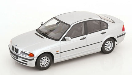1:18 scale silver BMW diecast model car with detailed interior and alloy wheels
