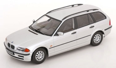 1:18 scale silver BMW diecast model car wagon with black trim, angled front view