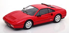 Red 1:18 scale diecast model sports car with detailed exterior, black interior and white wheels