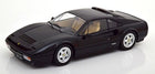 1:18 scale black diecast model car with tan interior, classic sports car design